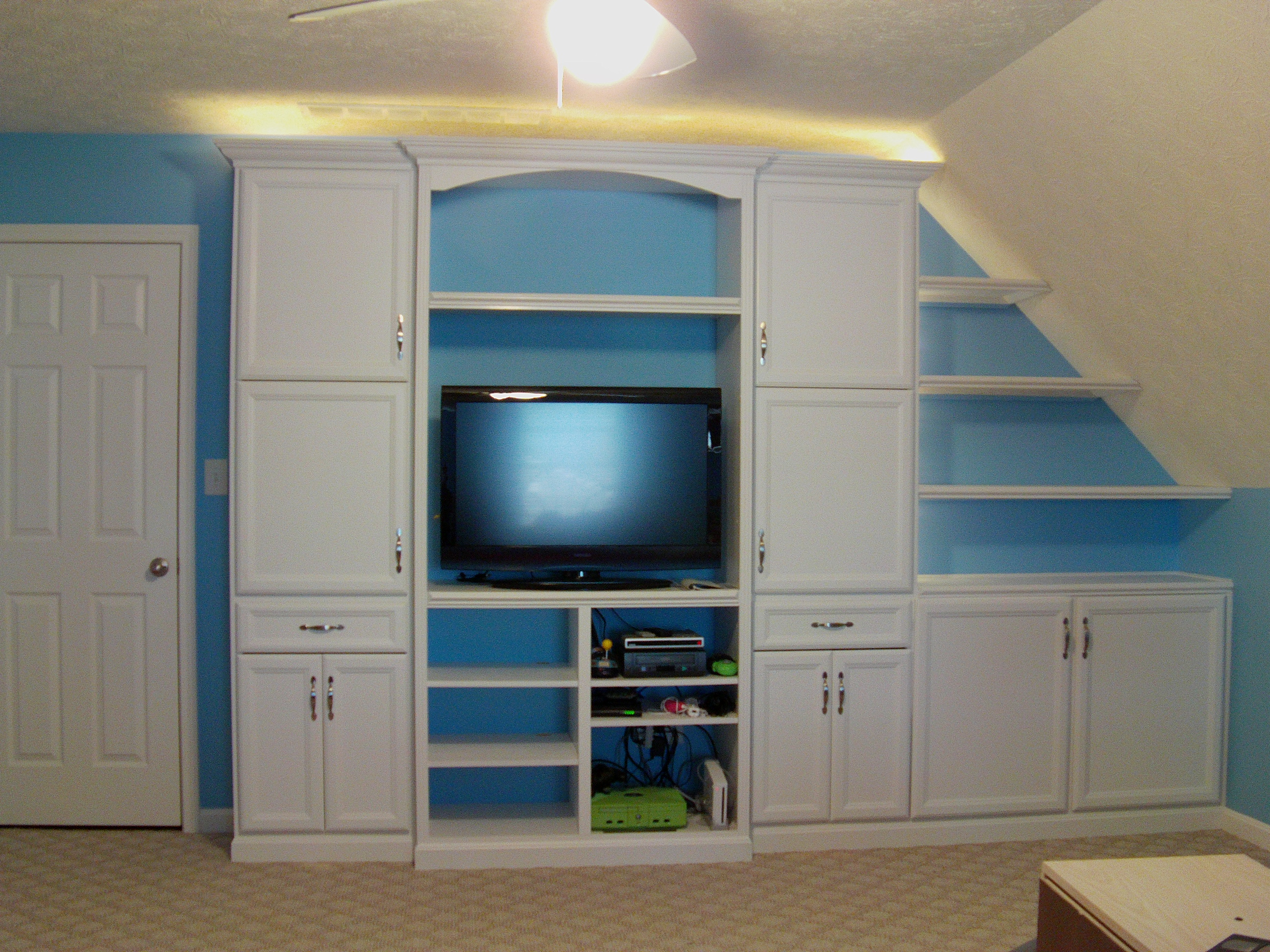 custom media center with 5-piece doors painted white