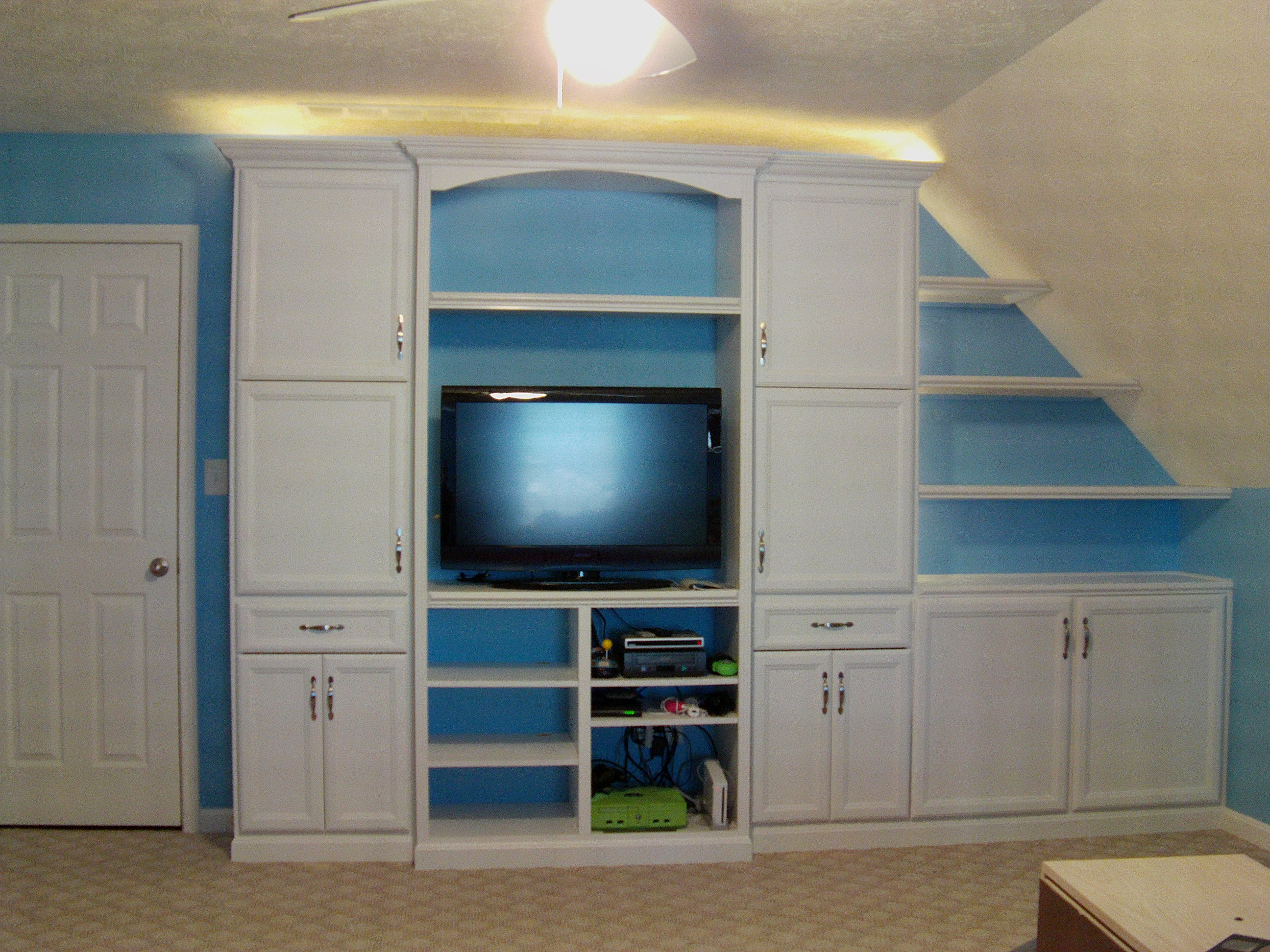 Custom Media Center | Louisville, KY custom media center with 5-piece doors painted white