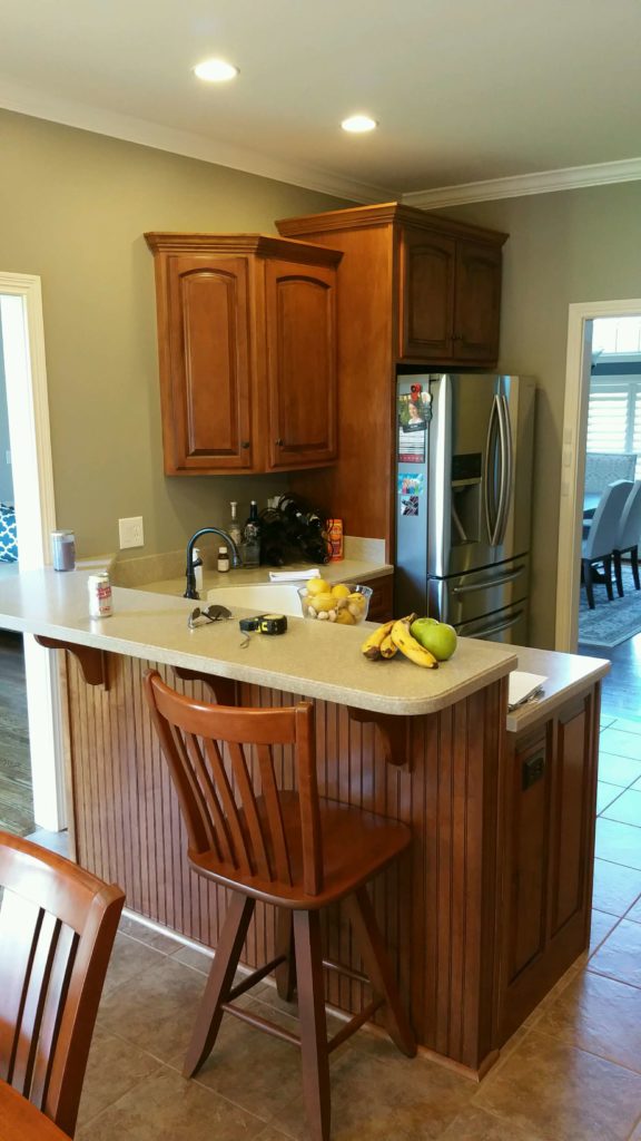 Kitchen Cabinets Before Refinish by Ryan