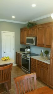 Kitchen Cabinets Before Refinish by Ryan