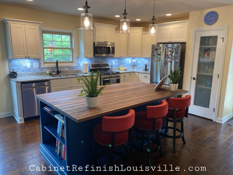 This is the kitchen after Shaker transformation and new island with walnut butcher block countertop.